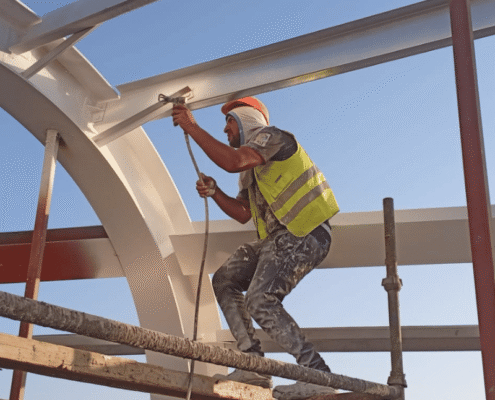 Team from Qasr Al Himayah, a leading interior finishing contractor in Jeddah, installing ceiling panels